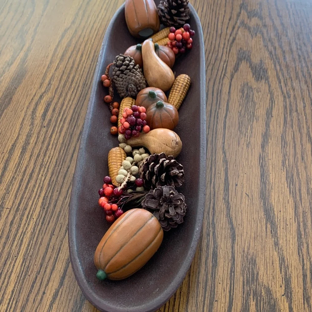 Fall-Themed Decorative Centerpiece in a long shallow bowl.